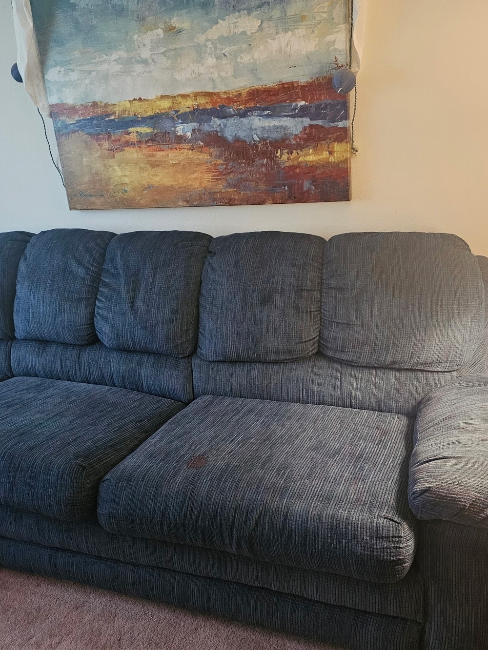 Blue Two Piece Sectional Sleeper With Right End Manual Recliner.